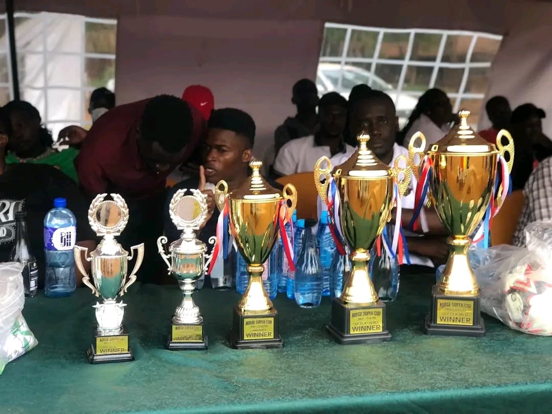 Championship trophies for the Ndege Super Cup 3rd Edition organised by NALFA CBO at Awelo Primary School, Siaya County, Kenya.