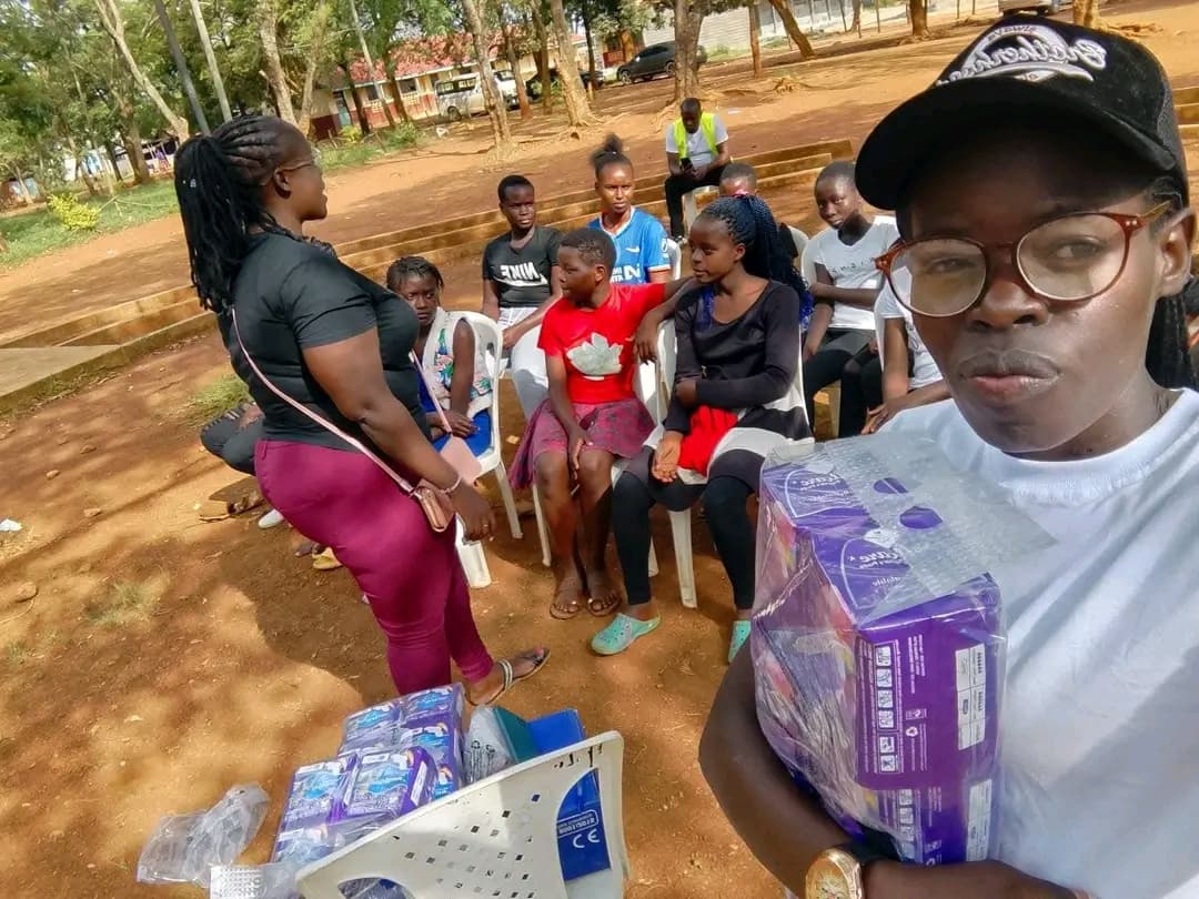 NALFA CBO volunteers speaking to girls about menstrual hygiene and personal health during the 3rd Edition of the Ndege Siaya Super Cup Tournament in Siaya County, Kenya.