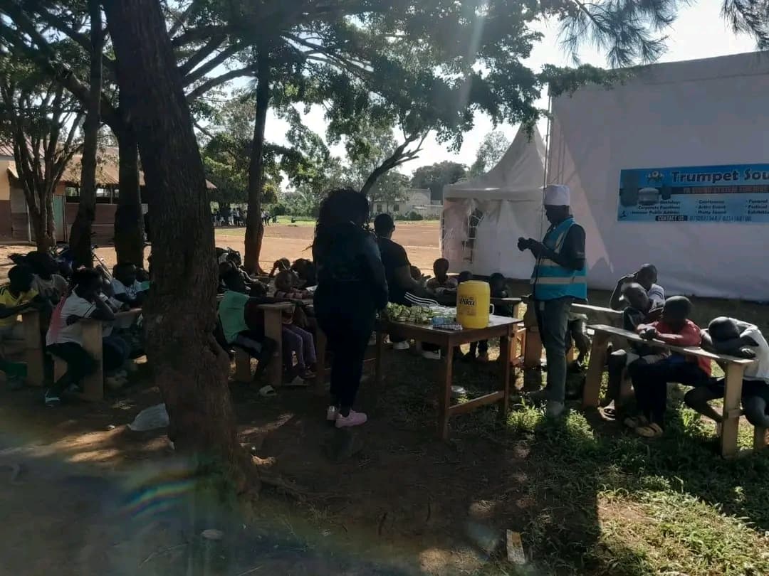 NALFA CBO volunteers engaging children during the Ndege Siaya Super Cup Tournament by providing free lunch, life skills, and educational talks to keep them active, inspired, and engaged throughout the school holidays.